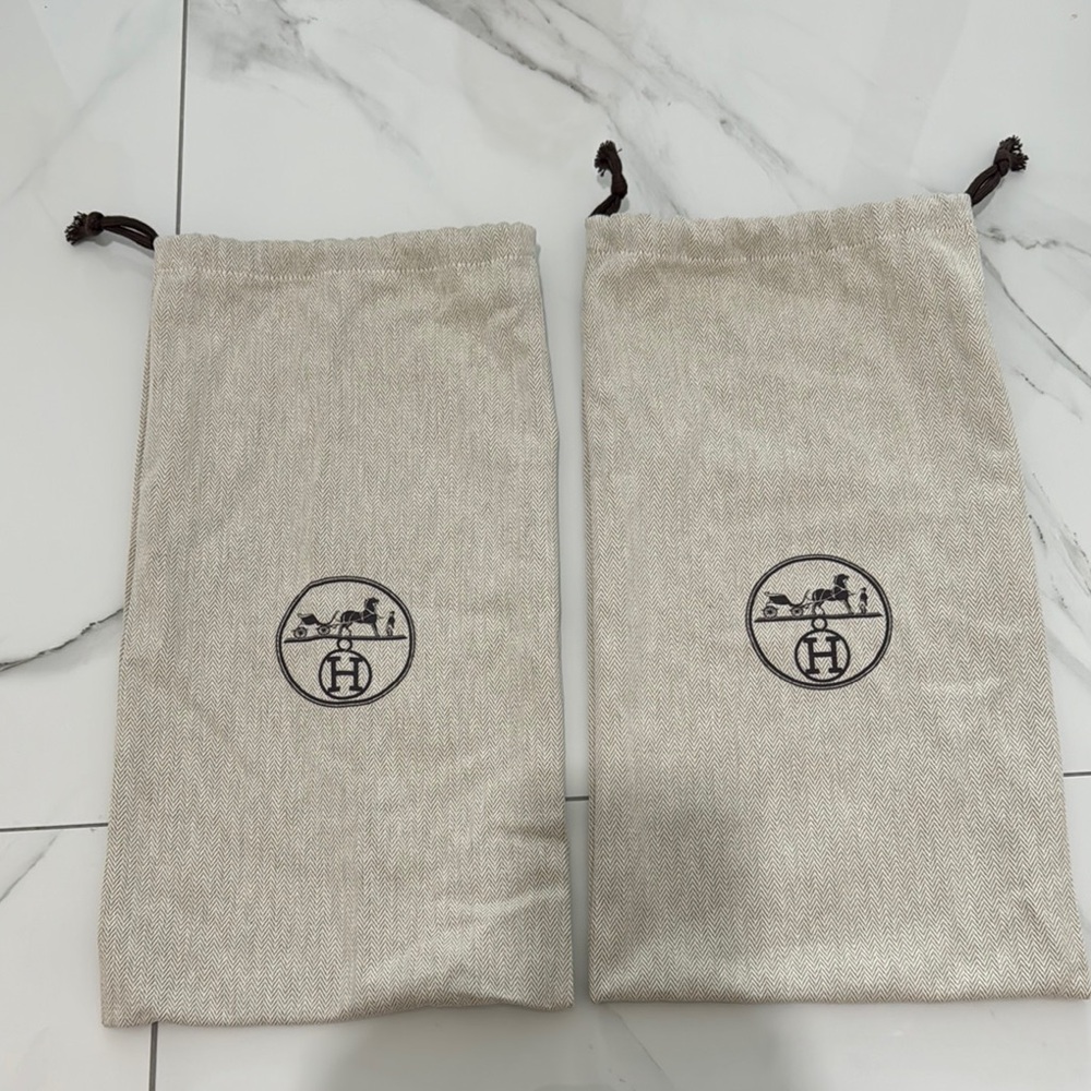 A pair of Hermès Authentic Iconic Dust Bags